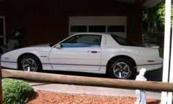 Classic 1990 Pontiac Firebird, 3.1 v-6 auto, white with blue pin stripping, 35,000 original miles, original owner, like new condition, garage kept, auto, ps, pb, am/fm cassette player, bose system, grey and black interior, 2 door hatchback, new fuel pump