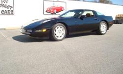Stk#002 1991 Chevy Corvette Exterior: Black original paint and a beautiful and straight body, original rims with almost new tires, flaps on front and rear fenders, dual stainless exhaust, extensions on each side, removable tinted glass top, power antenna,