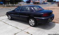 1995 Black Pontiac GRAND-AM (SE)
With a 3.100 Engine V-6
Has a Full Tank of Gas
154,000 Miles
26-Miles per Gallon
Remote Keyless Entry and Alarm System by GM Good wrench
4-Doors
Dash Cover
AM/FM Cassette Stereo
Tilt Steering Wheel
Cruise Control
Fog