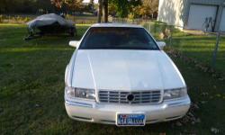 I'm selling a 1995 Cadillac eldorado it has 165000 miles runs and drives great im asking 2500 OBO it needs some work the paint is decent but its an early 90's GM so the clear is messing up the interior is in good shape none of the leather is torn and it