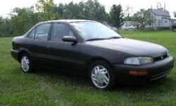 1995 Geo Prizm Automatic, AC CD PS 4 doors, clean title, tags are good til April 2014 needs TLC, runs likse a Toyota Corolla, asking $1475 call 236-2743