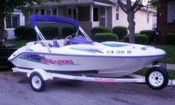 This is a very fun boat, It has 2 rotax inboard engines with 85 horse each. This boat runs good, the int. has some cracks an some fading , newer bikini top in excenllent shape, comes with a morning cover, 4 life vests an tube an, extras. This boat is