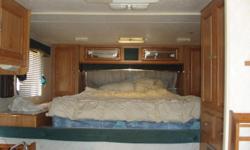 This camper is fully loaded with toilet shower micro ref. stove AC&nbsp;.Cap over Queen size bed. This is a big camper 3/4 ton truck long bed or dully.