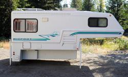 9.6 Bigfoot Truck Camper in excellent condition. Fits on long bed trucks. Call/e-mail for more details.