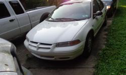 THIS 1996 DODGE STRATUS SE SDAN IN WHITE WITH GREY CLOTH ANDA 4 CYLNDER AND A AUTOMATIC WITH AIR,POWER WINDOWS AND LOCKS TILT ANDC RUISE AM/FM. THS CAR IS VERY CLEAN AND A CLEAN CARFAX AND NO RUST WITH ONLY 81,000 1 OWNER MILES AND HAS NEARLY NEW TIRES