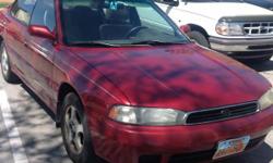 1996 Red Subaru Legacy for sale. It is in fair condition. There is some corrosion on the exterior paint. The interior is nice, and it runs great. It is a cute car, and it has a sun roof. Call Andrea at 801-931-7239 if you are interested.