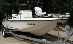 1996 Wahoo.&nbsp; 18.5 ft.&nbsp; Center Console.&nbsp;&nbsp;150 hp Mercury offshore outboard motor and&nbsp;12/24 Great White trolling motor.&nbsp; Also has fish finder and&nbsp;marine radio.&nbsp; Comes complete with galvanized trailer,&nbsp;spare tire,