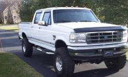 1997 F-250 Crew Cab XLT 4x4 , 7.3 powerstroke diesel,350 hp,750 lbs tourqe,stage 2 injectors,6 position power chip ( economy, daily, light tow, heavy tow, cold idle, hot),66 millimeter turbo,banks 3" exhaust,intercooler plus duct work,1 ton running