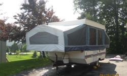 1997 Rockwood Premier Pop Up Camper. Very good condition and well maintained. Stored inside. Sleeps 8 with 2 dinettes (one standard and one wrap around). Has heater, refrigerator, inside/outside stove, pump sink, and awning. Has a queen and double bed at