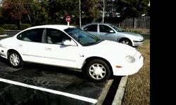 98 ford taurus FFV V6, 4 door,&nbsp;good condition, no dents, nice paint, runs good,&nbsp;everyday driver, 159,968 miles, blue books at $3,900 asking $2,500 obo. call Christina at -- anytime.