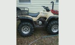 it is a honda fourtrax with 28 inch tires and rims it has 8 spoke rimes tane in color with a 3 inch lift kit has a basket rack in the back it has a stander transmission it is a very nice fourweller the person who purches this unit well b well pleased the
