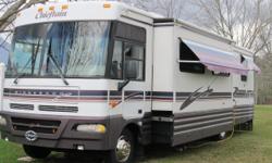1999 winnebago chieftain motor home 35 ' 2 slides queen bed,corian counter tops,dinnett table with chairs,couch,recliner, storage under bed,2 air conds,very well keep,just dont go much enymore,lots of outside storage.and entertainment center