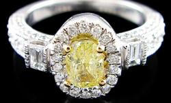 See Item at ONCE UPON A DIAMOND @ 6112 Line Avenue in Shreveport, LA 71106 across from Superior Grill or call to inquire at ...&nbsp; LOTS MORE TO SEE
&nbsp;
1.00ctw Fancy Yellow Canary Diamond Halo Style Engagement Ring 14K White Gold
Material Info: