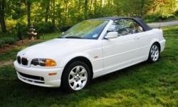 White with grey leather interior, automatic, 67,000 miles, stored in winter months. Great condition and well maintained.
