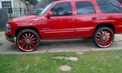 2000 Chevy Tahoe...Tangerine Color....28 inch painted rims to match body color.....DVD, CD player...A/C and Heat works....Good condition...Only serious reply please.....
