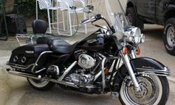 Beautiful 2000 Harley- Davidson Roar King Classic (FLHRCI) This beautiful bike only has 21,230 miles on it. 20,000 mile maintenance completed by Frazier's Harley-Davidson
It is vivid black with lots of chrome (see pictures). The engine is