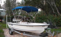 Fiberglass 15ft-2in , Self bailing, anchor locker w/anchor, aerated live well, large storage, rod holders, compass, tachometer, fish finder, bimini top. This Boat is in great condition and ready to go. Also cooler, life jackets and flares. (813) 210-2145
