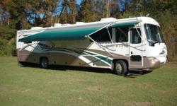 This motorhome is a 39' Class A RV Diesel Pusher with 34,575 miles. It sleeps 4. With a 330 Cummins Engine, Onan diesel generator and 2 roof A/C's; this motorhome also has leveling jacks, tilt steering, cruise control, rear vision camera/monitor, brake