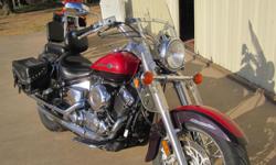 This Vstar is in excellent condition with floor boards, windshield, saddlebags and back rest for rider.