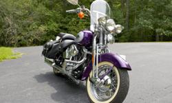 A real beauty and a rare find! A beautiful retro looking 2001 FLSTS fuel injected Heritage Springer. It's always been garaged and pampered with very low miles. PLUS THOUSANDS in EXTRAS. The engine has been amped up and made bigger with Screamin' Eagle