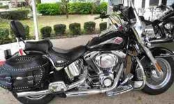 2001 Black and Chrome HD Softail Classic, FLSTCI, 1450cc, Fairing Windshield, Saddle Bags, New Tires, Front & Rear Brakes, Quick Disconnect Windshield, 14,000 miles . If you are interested in this great touring bike, please call 386-847-2750.