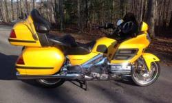 This auction features a 2001 Honda Goldwing in Mint condition. It has been garage kept and has only 42,105 miles. It has lots of chrome add ons and passenger floor boards with flip up foot rests. I have added a tinted sport windshield but also have the