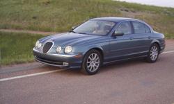 Beautiful 2001 S-Type(classic style Jag). Excellent care & maintenance. 105,000 miles. Just had new transmission professionally installed. All service papers available since I have owned this car. Cream Puff. Must see.