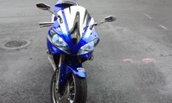 I have a one of a kind yamaha r1 I replaced almost everything on this bike, engine, body, all electrical work was redone, new brakes, new tires, lots of extra chrome parts and LED lights on the body of the bike, alarm system lots of accessories too much