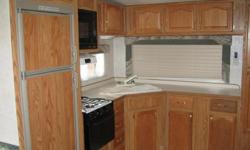 27 foot glufstream fifth wheel large slide out. centeral ducted air and heat,refidgerator freezer. This is a new condition fifth wheel.Hitch included.priceisnegotiable will consider all offers.