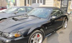 2002 Ford Mustang 128,000 miles - two adult owners handled with care ready to drive absolutely mechanicaly sound using mobile synthetic oil no oil use between changes - custom cloth roof 6 months old in excellent condition in and out - leather interior