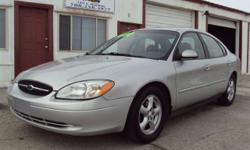 2002 Ford Taurus.
&nbsp;Great full size 4 door car with 6 cyl. Gas mileage
Has nice tires on factory mag wheels a remote entry.
lots of power items like seats locks and windows.
Has a C/D player and A/C. Everything works.
&nbsp;It has 135k. For miles. The