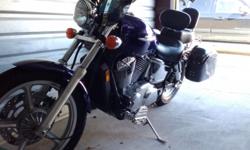 2002 Honda Shadow 1100 for sale. 10,800 miles, excellent condition (garage kept), new tires, windshield, foot rests not pegs, hard sadle bags, cover, 2 helmets, 2 leather jackets, 2 pair gloves and 1 pair of chaps. Not a scratch on it.. (Have to sell