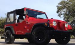 2002 Jeep Wrangler 4X4 Sport Edition beautiful red with full removable canvas top and half metal doors only 106213 low original miles. Has the dependable and reliable gas-saver 4cyclinder engine matched with a smooth shifting 5-speed Manuel transmission .