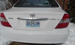 Toyota Camry 2002 LE, white exterior, Sun roof, cloth interior, very clean inside and outside, drives great, auomatic transmission, automatic windows, no leaks, good tires, resent engine oil changed, 4cyl. 4WD, seats are intact, no tears,&nbsp;gas
