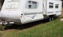 We have enjoyed this camper but its time for us to upgrade. 11 foot slide that ads lots of living space, queen bed at front of camper, sofa and dinette fold down for sleeping plus 3 bunks for the kids! Double sink, microwave, and stove top. Bathroom