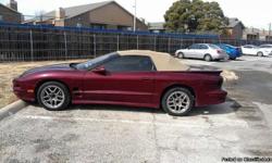 Maroon convertible, 93 thousand miles LS1 V8 engine automatic needs some work and a fuel pump.