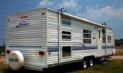 Very nice, clean 33 ft Nomad Skyline. Sleeps 8, AM/FM/CD, new Goodyear tires. We are the second owners and have all original paperwork and manuals. Lots of extras to be included with purchase. Blue / White interior colors. Full kitchen, rooftop A/C, nice
