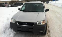 Selling a Grey 2003 Ford Escape 165,500 miles. Good runner starts excellent in very cold conditions. Has remote start and security system. 6 Change&nbsp;CD player AM/FM radio stock. Great vehicle for new drivers also has four wheel drive, and tires are