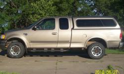 Extended cab, 4 wheel drive, automatic, power windows, power sunroof, topper, 109,000 miles.