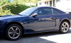 I have a 2003 mustang GT V8 Coupe its, premium edition. Leather seats, automatic
trans, powered evetything, premium wheels and Mach hifi system loaded. WITH CD PLAYER.
CLEAN TITLE , NO ACCIDENTS, 8.5/ 10 CONDITION, RUNS GREAT!! WITH ONLY
48,481 MILES ON