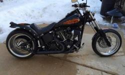 2003 Harley-Davidson Softail.has only 3,600 miles on it!!!
Bike has a brand new battery. Custom front wheel and 240 rear wheel; Stretch tank; Custom flow pipes; Drag bars. The flame job is painted on but the "Hot Topper" lettering is a decal underneath