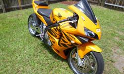 This listing is for a 2003 Honda CBR RR 600. It has 10,700 miles on it and has been lowered and stretched with a chrome swing arm and rims. Has an issue: won't start up when it is hot (possibly the starter). PLEASE SERIOUS INQUIRIES ONLY.*I will
