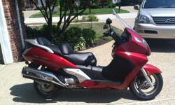 This Honda Silverwing Scooter is a one owner, garaged, perfect condition with 3600 miles. Has dixc brakes, under seat storage, great gas milage, beautiful silver chrome. SENIOR OWNED, selling due to health reasons. It has a new battery, runs perfect. This