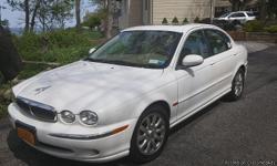 2003 Jaguar X-Type, White Exterior with tan leather, Mint Condition like new, Super Clean, Low Miles (54,800 miles), Garage Kept, Original Owner.
IF YOU ARE INTERESTED IN BUYING THE CAR &nbsp;PLEASE TEXT ME (646) 583-5323