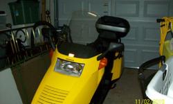 Yellow- road capable scooter- 2 helmets- cover- extended windshield- has only 1,700 miles- good condition