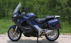 2004 BMW K1200GT Dark Blue with removable bags and BMW soft fuel tank bag. Lots
of creature comforts including cruise control, J&M CB/intercom with MP3 input,
heated grips, heated seat, cruise control, handle bar risers, halogen driving
lights, and
