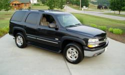 2004 Chevrolet LS Tahoe? 4-Door? 4X4? 5.3 Liter V8 OHV Engine? 4-Speed automatic overdrive transmission? Exterior color is dark gray metallic... interior color is gray / dark charcoal...Features of this vehicle are air conditioning w/ separate driver /