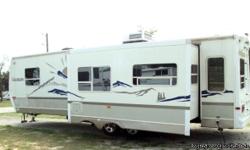By Dutchmen Classic- Super Clean!
2 door entry, 44" booth Dinette, Center Kitchen, Double door refrigerator, microwave, stereo, TV, Ducted AC, Fiberglass Exterior, Gas/Elec. Water Heater, Rear Ladder, Rear Living Room, full size shower. Please call