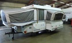Fleetwood Bayside Tent Trailer; EXCELLENT CONDITION, weighing only 2,855lbs! This Tent Camper has a Slide-out and one tip-out, sleeps 7Air Conditioning, Awning, Stove, Furnace, Hot Water Heater, Outside Grill, Shaving Mirror, Storage Trunk on Front of