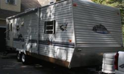 A well maintained trailer with one owner. No pets. Total weight 6351lbs. Sleeps 6. Slideout, passthrough storage, 13.500BTU Air Conditioner, E-Z store sofa, 2 swivel rocking chairs, in floor ducted heat, queen bed with underbed storage, 30gal fresh water,